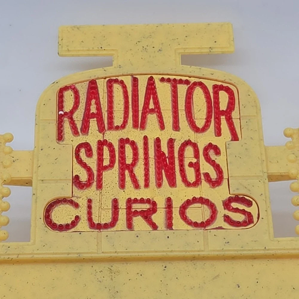 2005 Disney Pixar Cars Radiator Springs Lizzie's Curio Shop - Light Up Sign ONLY